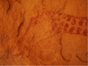 A rock painting dating back 12,000 years at Tassili n’Ajjer in Algeria. Photo © Mohammed Beddiaf.